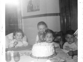 1955 May 28th Mary with bday cake.jpg